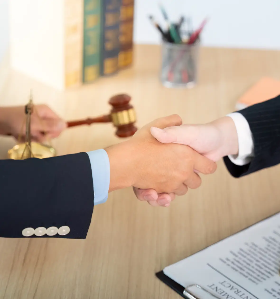 Lawyer handshake with gavel